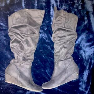 Black tall heeled boots